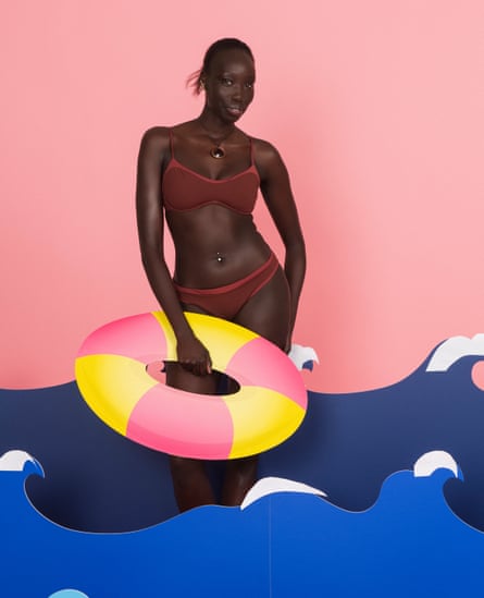Model in brown bikini