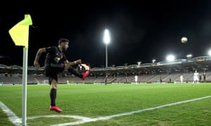 Bruno Fernandes prepares to take a corner for Manchester United against Lask at a deserted Linzer Stadion.