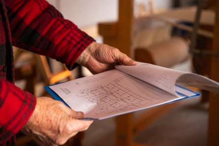 Hands holding paperwork