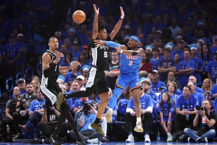 Shai Gilgeous-Alexander is defended by Stephon Castle during Game Seven