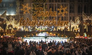 People crowd a Christmas market in Vienna on Sunday, the day before Austria entered a nationwide lockdown.