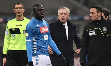 FBL-ITA-SERIEA-INTER-NAPOLI<br>Napoli's Senegalese defender Kalidou Koulibaly (2ndL) exits the pitch after receiving a red card as Napoli's Italian coach Carlo Ancelotti (C) looks on during the Italian Serie A football match Inter Milan vs Napoli on December 26, 2018 at the San Siro stadium in Milan. (Photo by Marco BERTORELLO / AFP)MARCO BERTORELLO/AFP/Getty Images