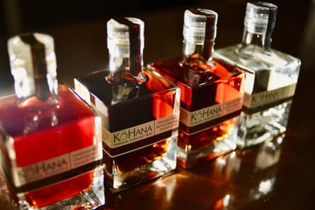 Four bottles of rum.
