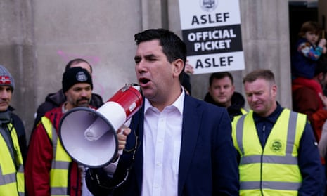 The Labour MP for Leeds East, Richard Burgon, joins rail workers on the picket line in Leeds.