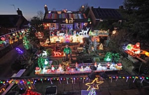 Eric Marshall in front of his Christmas lights display at his home in Bagby, North Yorkshire