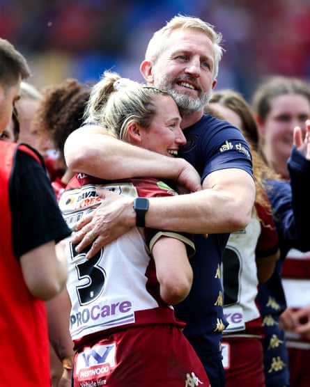 Denis Betts celebrates Wigan’s victory Challenge Cup semi-final victory over Leeds with Georgia Wilson.