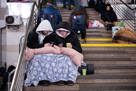 Ukrainians take shelter in a subway station during the overnight Russian drone and missile attack in Kyiv.