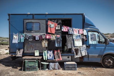 Mobile clothing stall in a truck converted as a house in the Praia do Amado car park.
