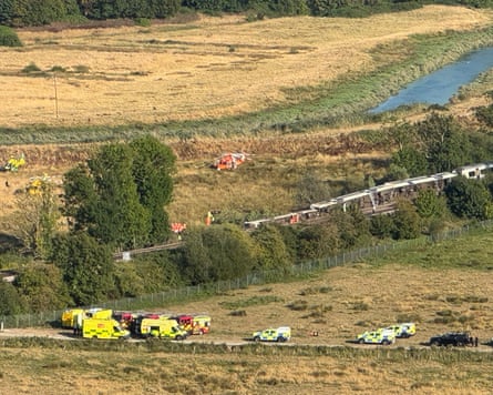 Emergency services respond to the train derailment near Lewes in East Sussex.
