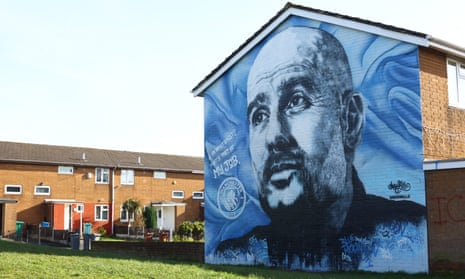 A mural of Pep Guardiola in Manchester