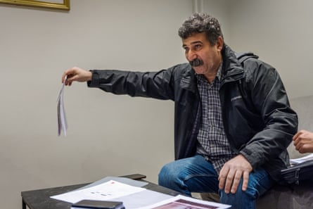 Thamer holding some papers