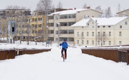 A cyclist travels through in Joensuu
