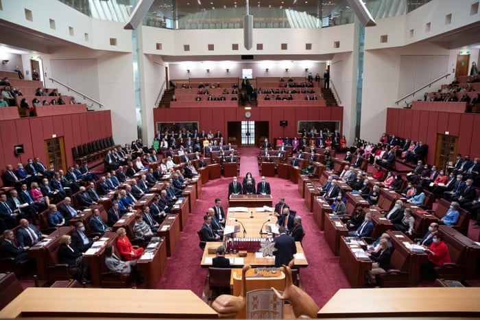 MPs join Senators in the Senate chamber during the opening of the 47th parliament this morning.