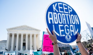Activists supporting legal access to abortion protest outside the US Supreme Court. 