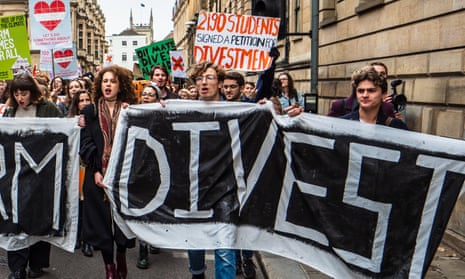 Cambridge University students protesting in 2018  demanding the university divest its unethical investments in arms and fossil fuels