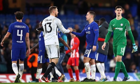 Eden Hazardshakes hands with Jan Oblak at the end of the match.