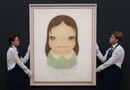 Big head … Sotheby’s handlers with Yoshitomo Nara’s Cosmic Eyes (in the Milky Lake) earlier this year.