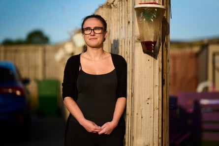 Francesca Davies, next to a fly catching bag outside her home in Congleton, Cheshire