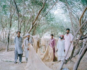 Fishermen prepare their nets in anticipation of the tide in Pakistan