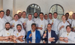 Des Gunewardena and David Loewi with some of the chefs who work for D&D group
