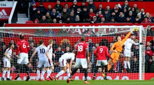 Burnley keeper Nick Pope makes a save.