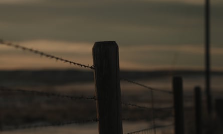 Barbed wire on a post.