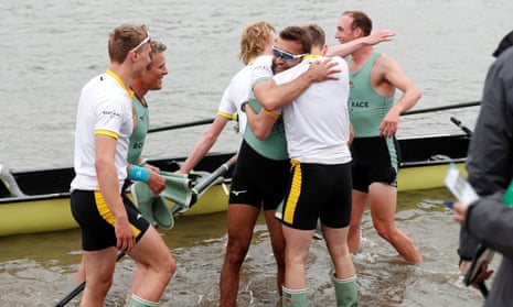 Cambridge celebrate winning the men’s boat race.