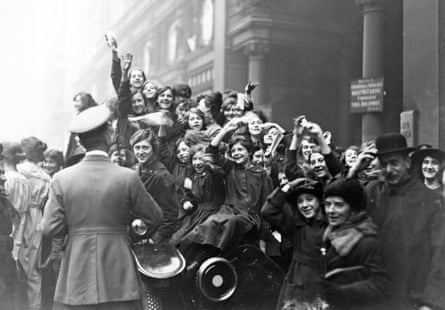Crowds in London celebrate the armistice at the end of the first world war.