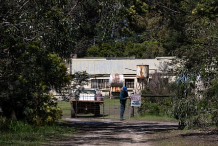 Man locking farm gates