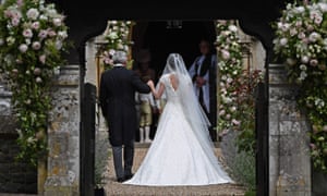 Pippa Middleton is led by her father, Michael, into St Mark’s Church in Englefield.