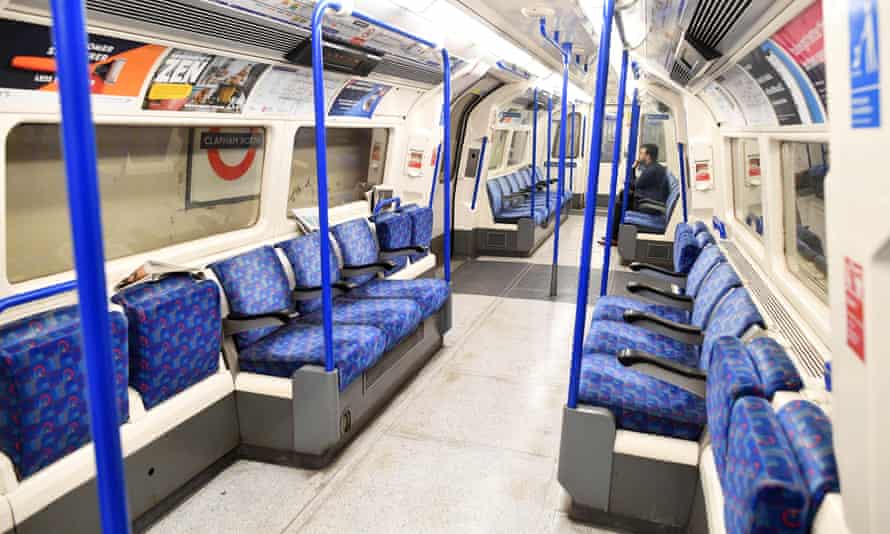 A nearly empty tube carriage during rush hour in London.