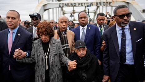 Hakeem Jeffries (L), Maxine Waters, Rev. Al Sharpton, Jesse Jackson and NAACP President Derrick Johnson march across the Edmund Pettus Bridge in Selma in 2025.