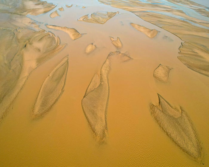 Sand overextraction weakening riverbanks as concrete demand soars
