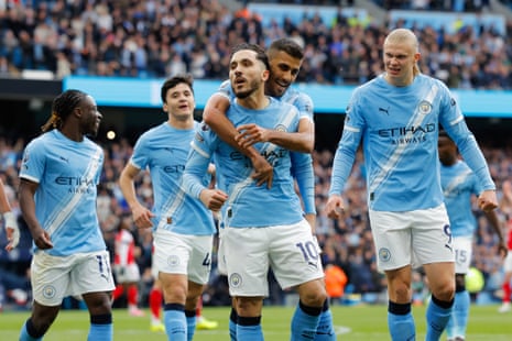 Rayan Cherki celebrates.