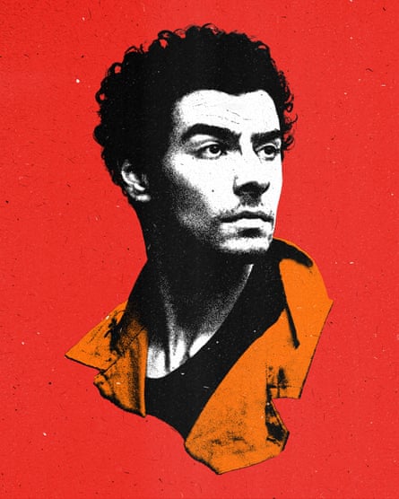 a young man in an orange jumpsuit