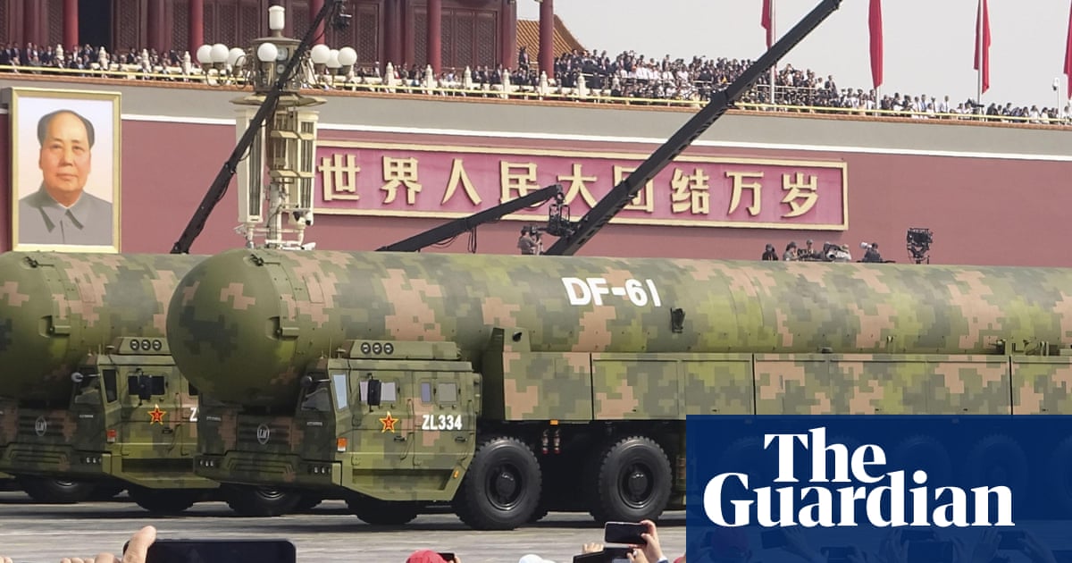 Nuclear triad and ‘robot wolves’: parade shows off array of Chinese weapons