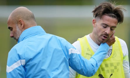 Pep Guardiola with Jack Grealish at training this week as Manchester City prepare for the Champions League final.