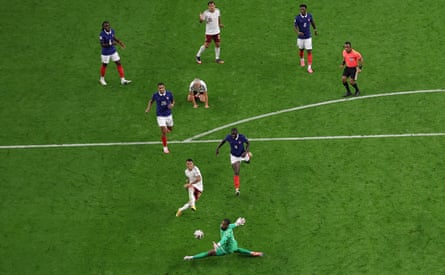Pedro Porro calmly slots in the second goal to put the game beyond France’s reach.