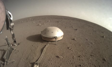 The InSight lander's dome-covered seismometer seen on the surface of Mars as the spacecraft loses power.