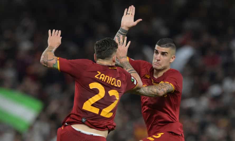 Nicolò Zaniolo celebrates with Gianluca Mancini after scoring the opening goal for Roma against Feyenoord.