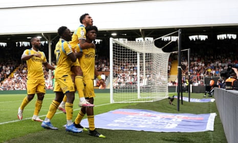Reading's Ovie Ejaria (right) celebrates scoring his side's second goal at Craven Cottage