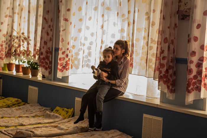 Refugees from Mariupol after traveling all day on the buses spent the night in a kindergarten in Zaporizhia, Ukraine