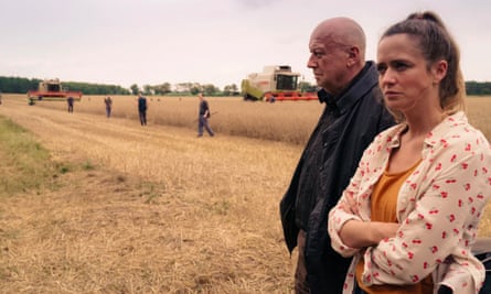 Sarina Radomski and Thomas Thieme in the television adaptation of Unterleuten, the novel by Juli Zeh about a village where a wildlife habitat is threatened by a planned windfarm.