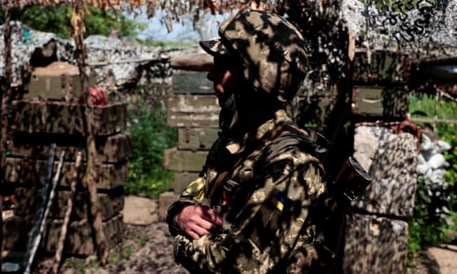 A Ukrainian serviceman stands at a position near a frontline, as Russia’s attack on Ukraine continues, in Donetsk Region, Ukraine May 29, 2022.