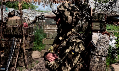 A Ukrainian serviceman stands at a position near a frontline, as Russia’s attack on Ukraine continues, in Donetsk Region, Ukraine May 29, 2022.