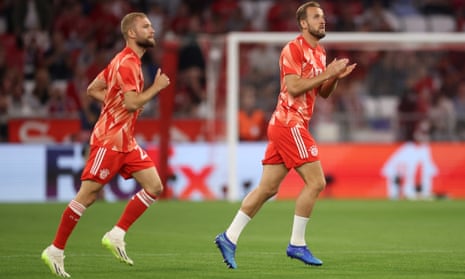 Konrad Laimer (left) and Harry Kane come out for the warm-up.
