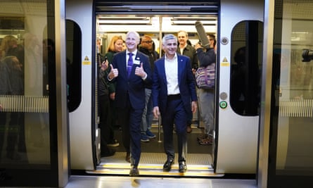 Mayor of London Sadiq Khan (right) and Andy Byford, Commissioner at Transport for London (TfL) disembark the first Elizabeth line train to carry passengers at Farringdon Station.