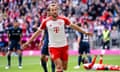 Harry Kane celebrates scoring Bayern’s second goal in their rout of Bochum.