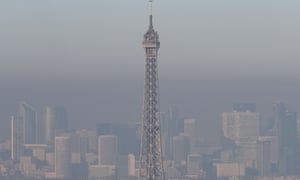 Grey Paris: the Eiffel Tower in the smog.