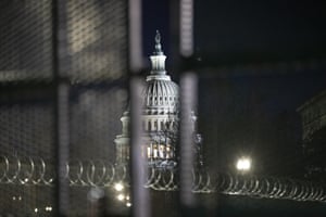 Razorwire and fences surround the Capitol building